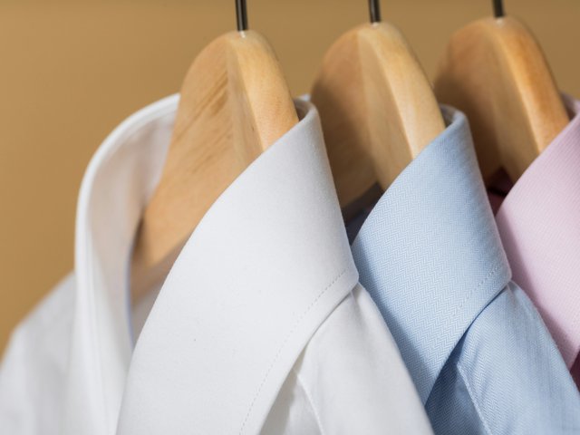 Business shirts hanging on a clothes rail