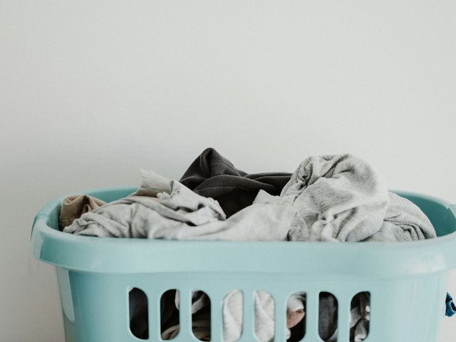 A laundry basket full of clothes
